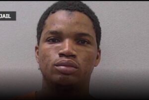 Mugshot of Hassanbunhussein Abolore Lawal, suspect in Gavin Guffey revenge porn case