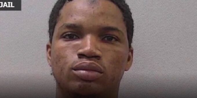 Mugshot of Hassanbunhussein Abolore Lawal, suspect in Gavin Guffey revenge porn case